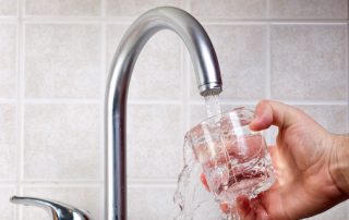 Drinking water from the water tap